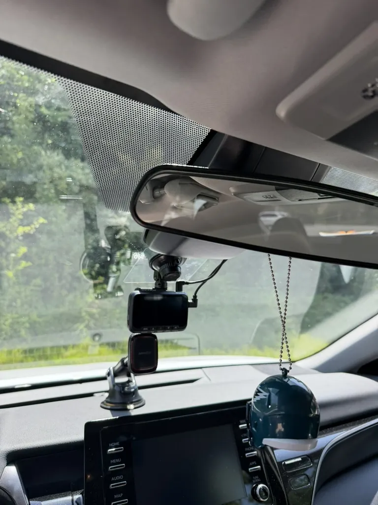 ROVE dashcam mounted near the rearview mirror in a 2023 Toyota Camry