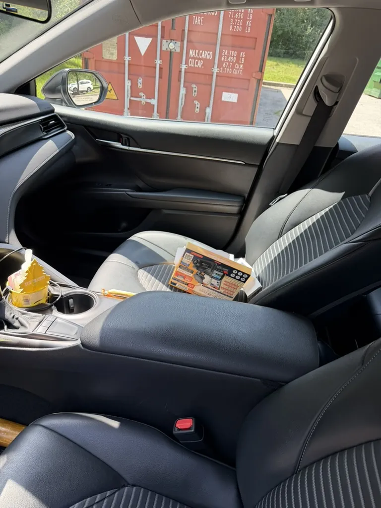 Toyota Camry cabin during dashcam installation at a Jessup industrial facility
